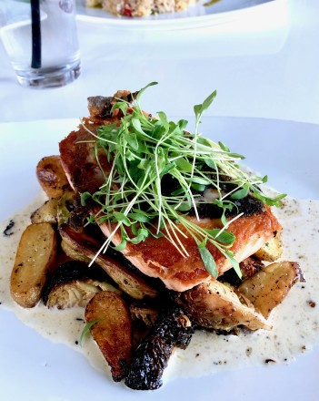 an-roasted-salmon-with-fingerling-potaoes-and-Brussel-sprouts-at-The-Parrot-photo-by-Joan-Wilder.jpg