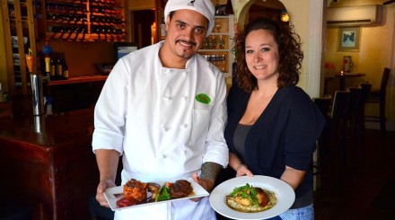 Chef Marcos DeSouza and manager Erica White with citrus glazed Long Island Duck Photo by Debee Tlumacki for The Boston Globe